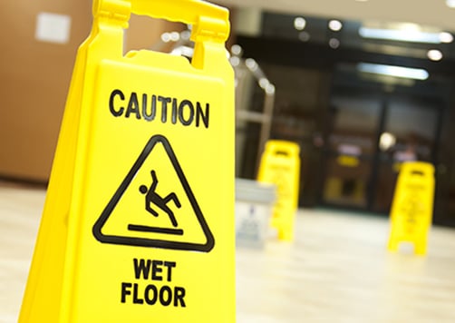 sign that says wet floor