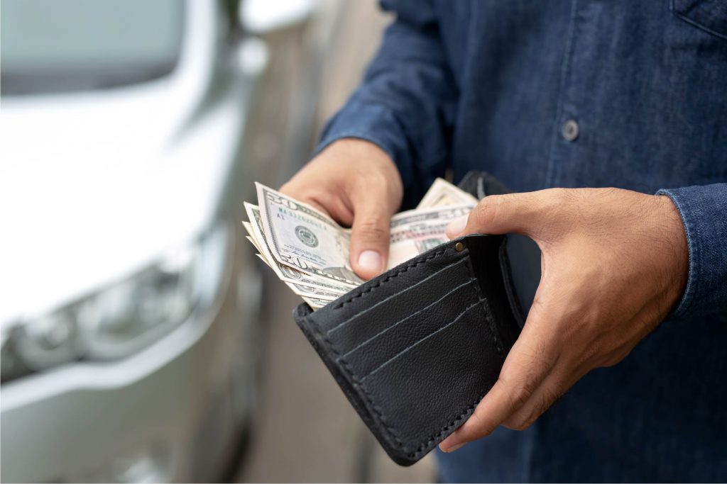 6 ways inflation has made your policy pointless. Image of a person with an open wallet: